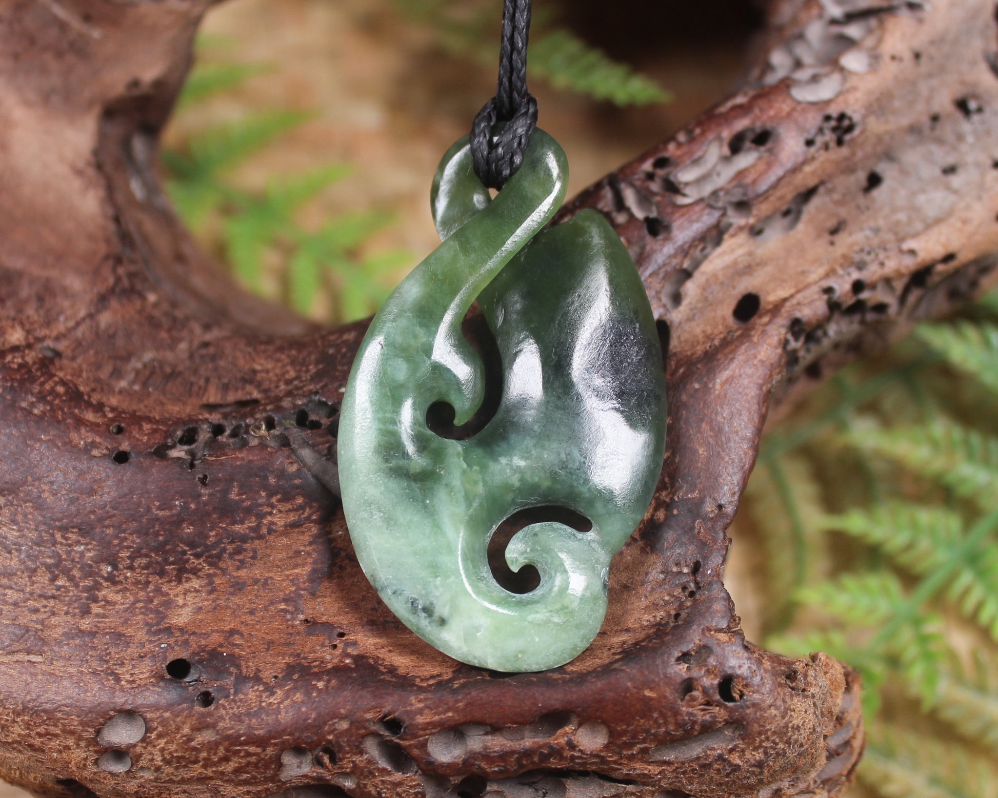 Koru Twist Pendant carved from Rimu Pounamu - NZ Greenstone