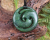 Koru pendant carved from Kawakawa Pounamu - NZ Greenstone