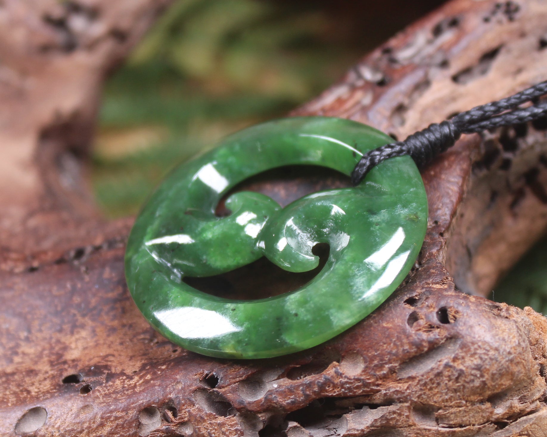 Koru pendant carved from Kawakawa Pounamu - NZ Greenstone