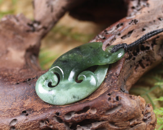 Koru Twist Pendant carved from Rimu Pounamu - NZ Greenstone
