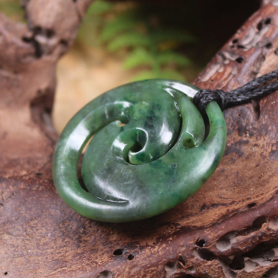 Koru pendant carved from Kawakawa Pounamu - NZ Greenstone