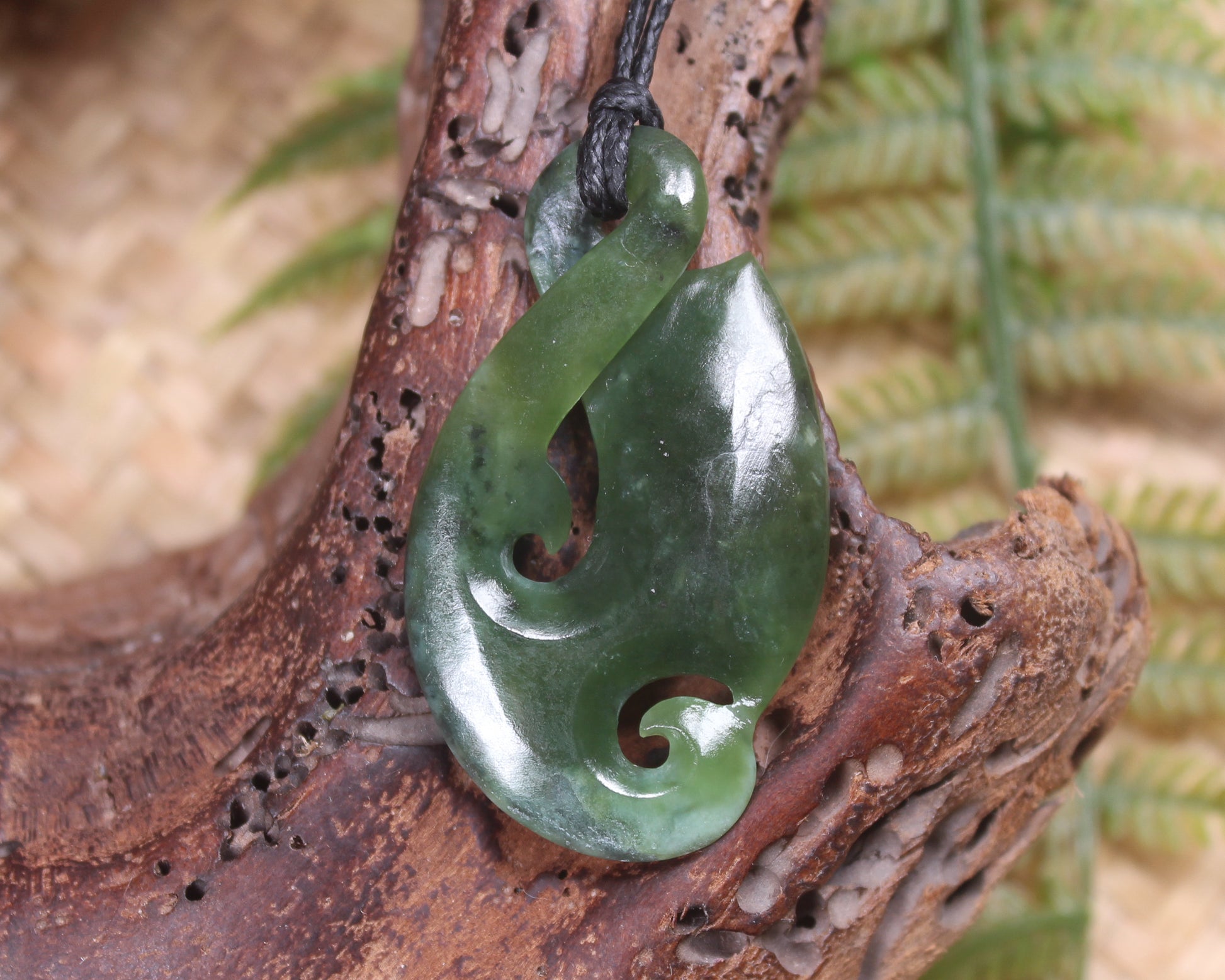 Koru Twist Pendant carved from Rimu Pounamu - NZ Greenstone