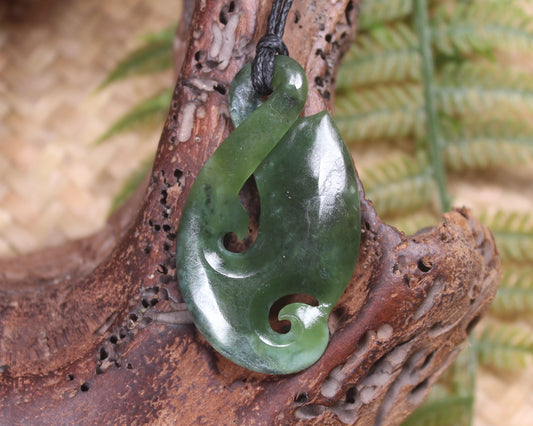 Koru Twist Pendant carved from Rimu Pounamu - NZ Greenstone