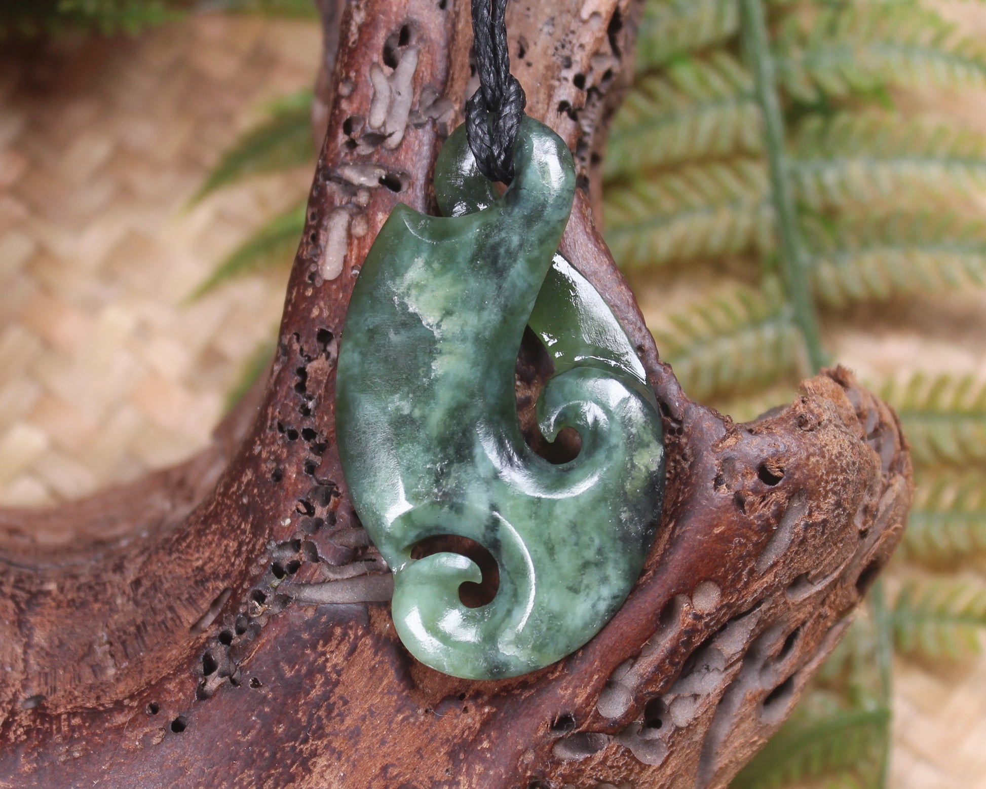 Koru Twist Pendant carved from Rimu Pounamu - NZ Greenstone