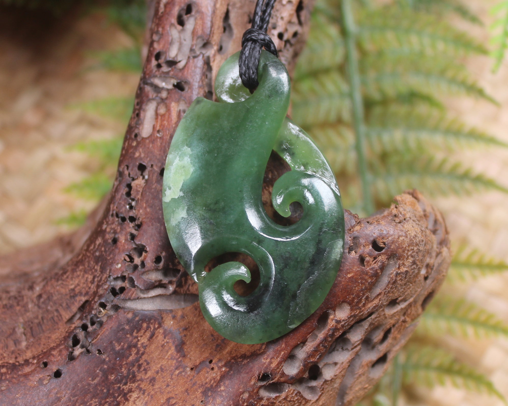 Koru Twist Pendant carved from Rimu Pounamu - NZ Greenstone