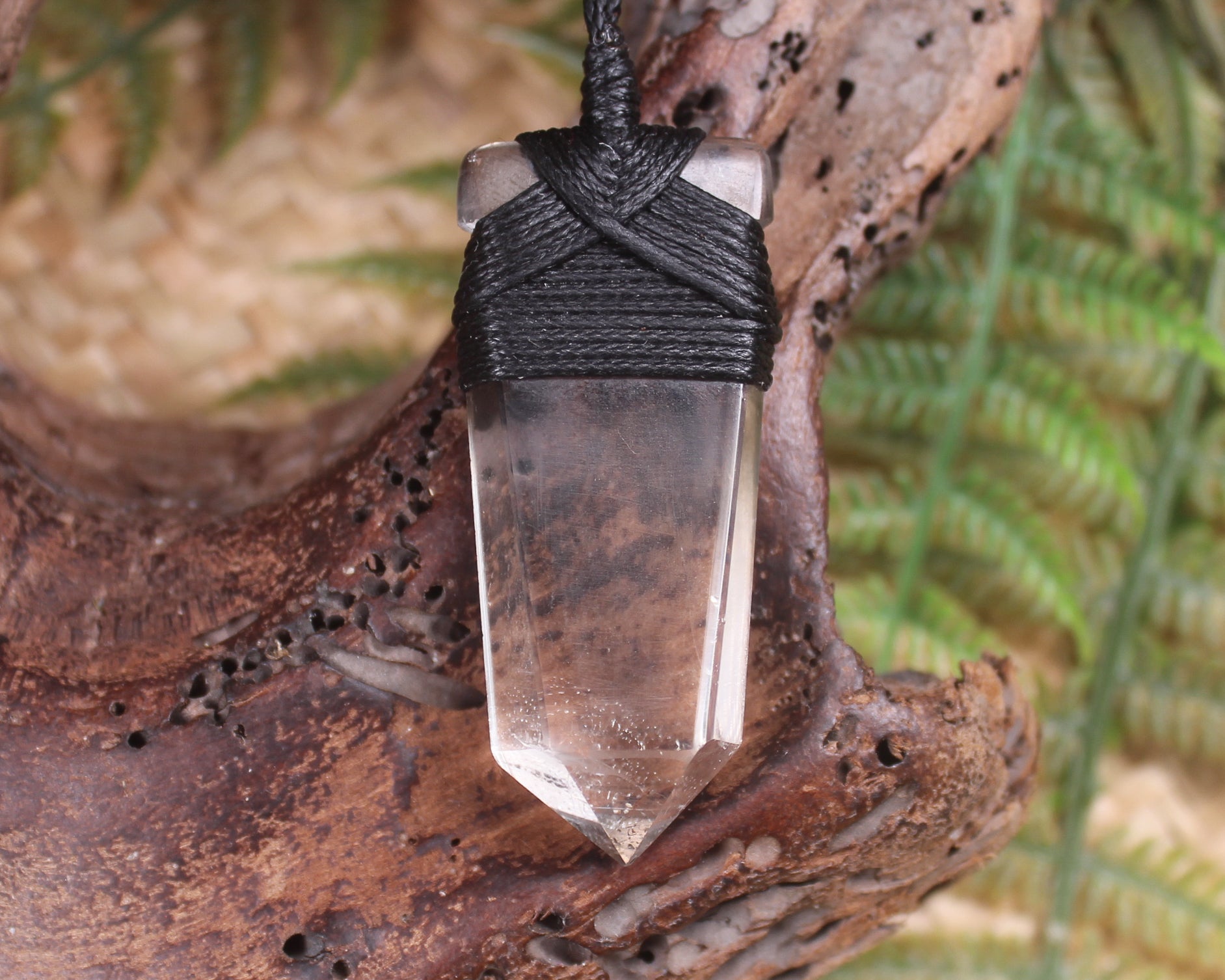 Pointed pendant carved from Smokey Quartz