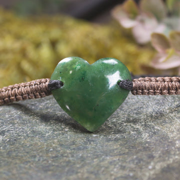 Adjustable cord bracelet with Kawakawa Pounamu