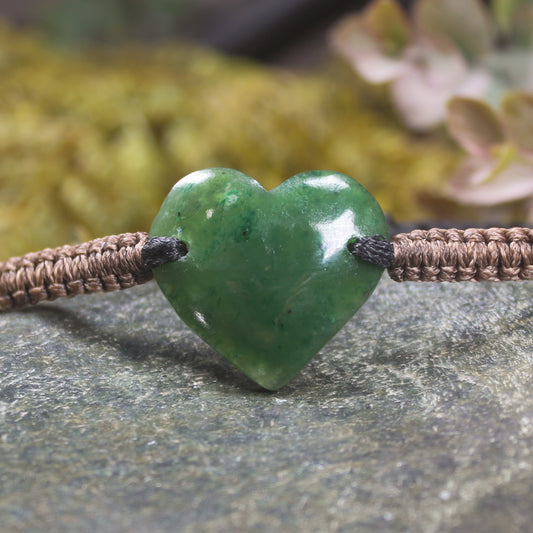 Adjustable cord bracelet with Kawakawa Pounamu
