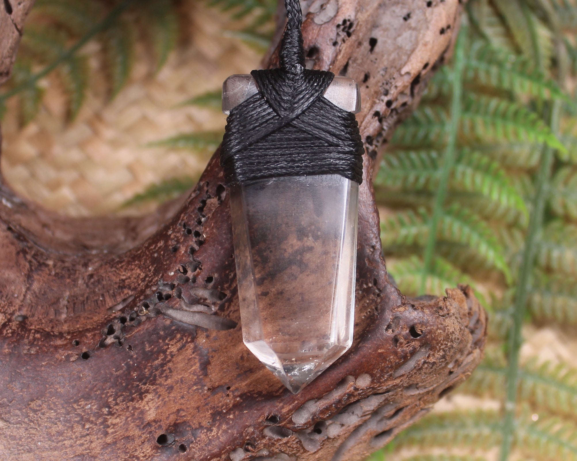 Pointed pendant carved from Smokey Quartz