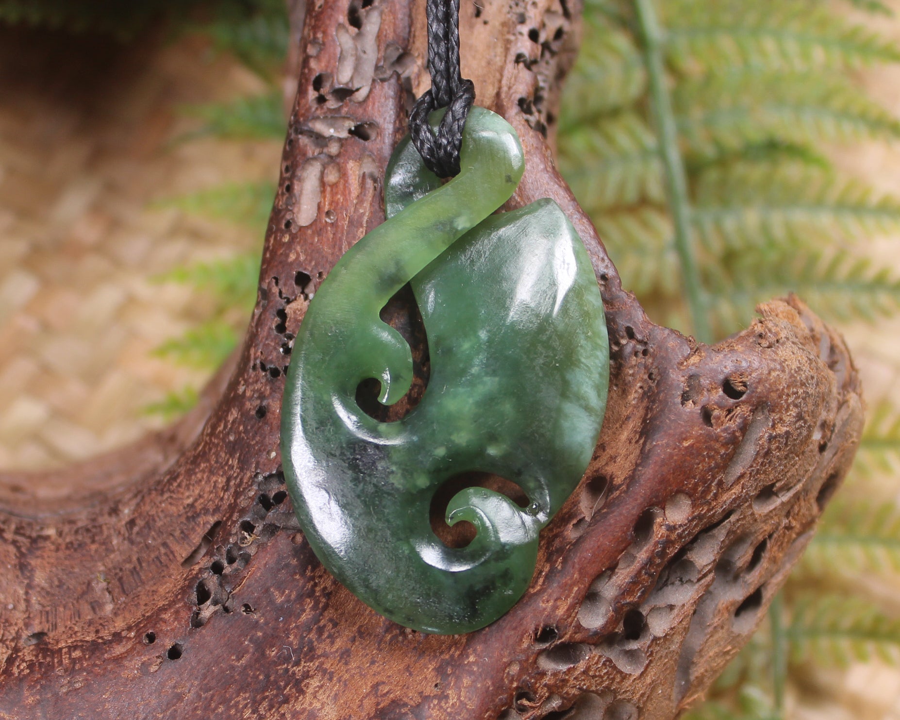 Koru Twist Pendant carved from Rimu Pounamu - NZ Greenstone