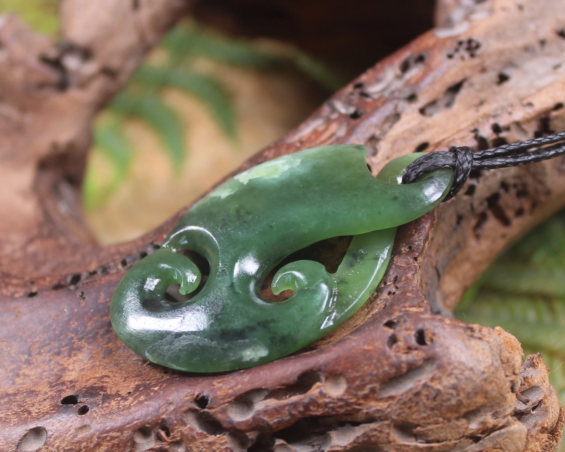 Koru Twist Pendant carved from Rimu Pounamu - NZ Greenstone