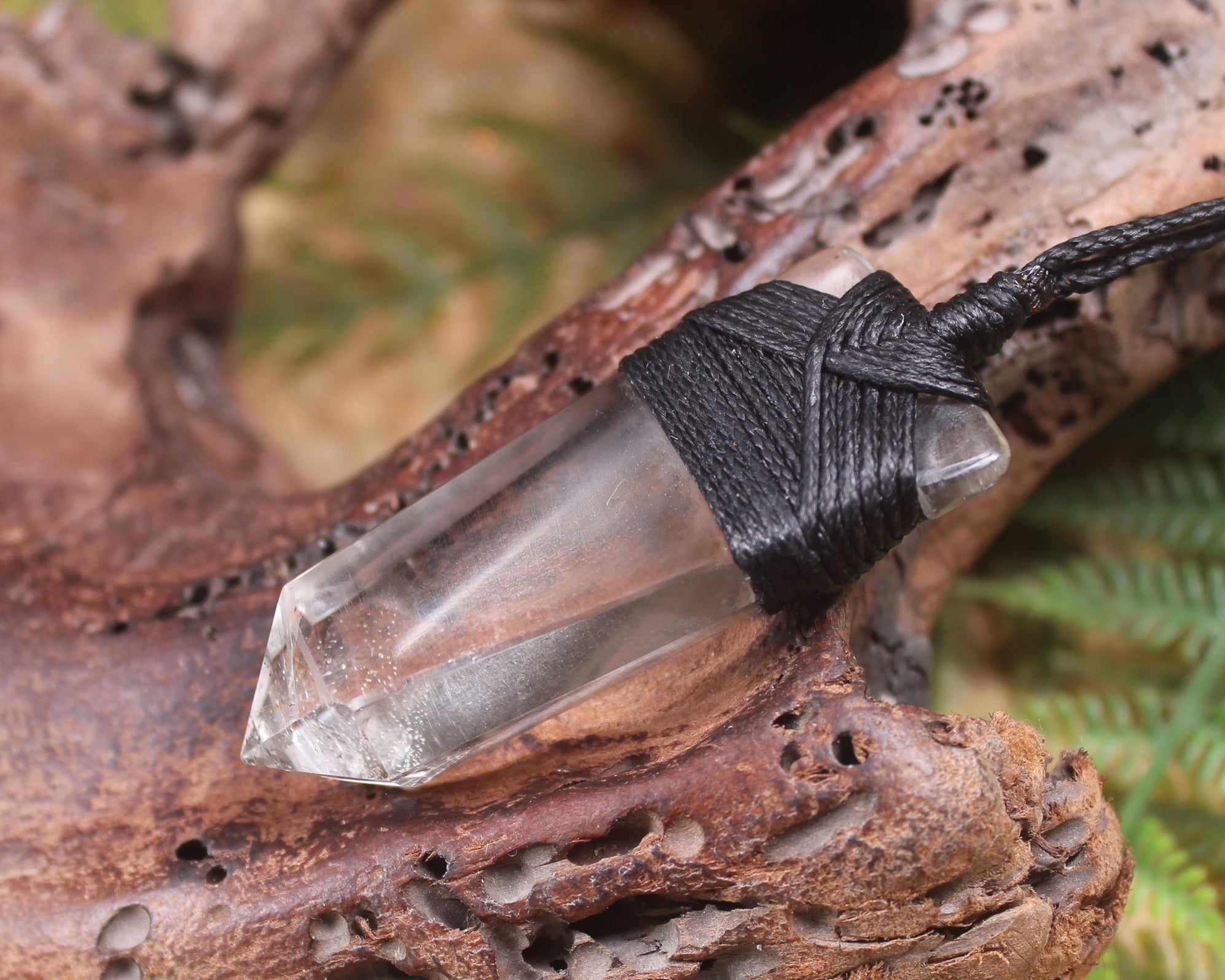 Pointed pendant carved from Smokey Quartz