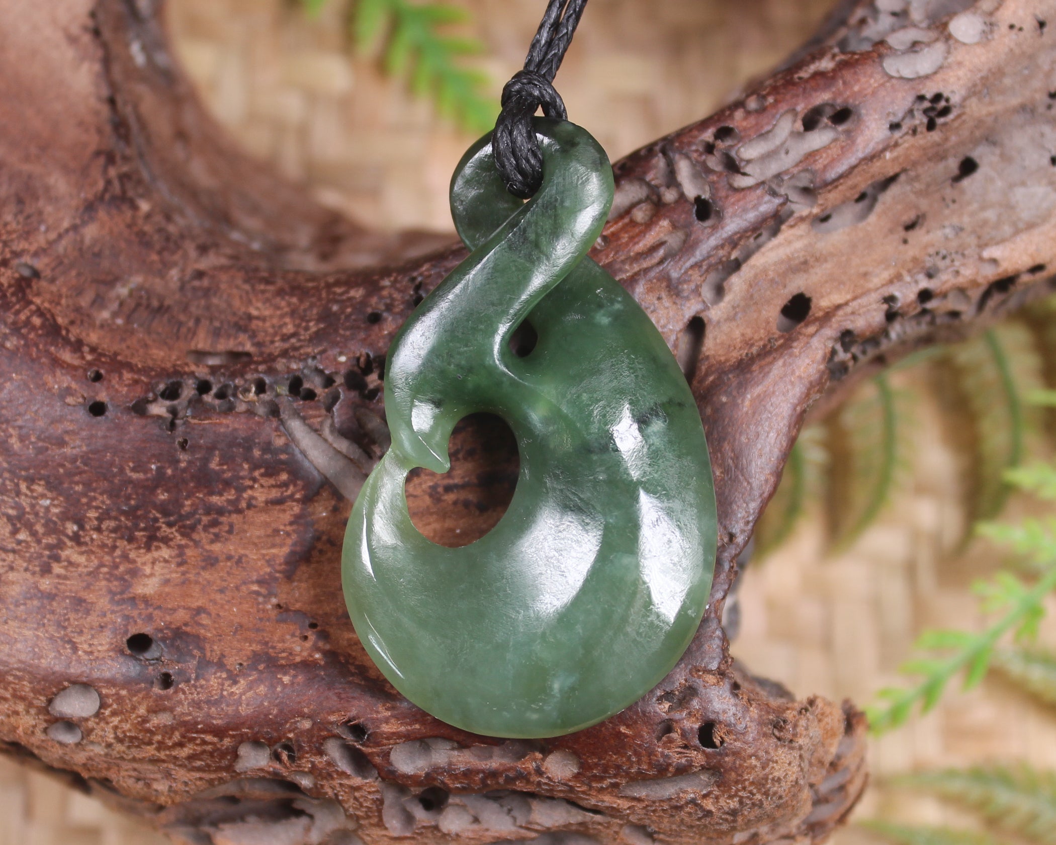 Koru Twist Pendant carved from Hapopo Pounamu - NZ Greenstone