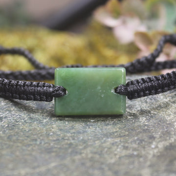 Adjustable cord bracelet with Hapopo Pounamu