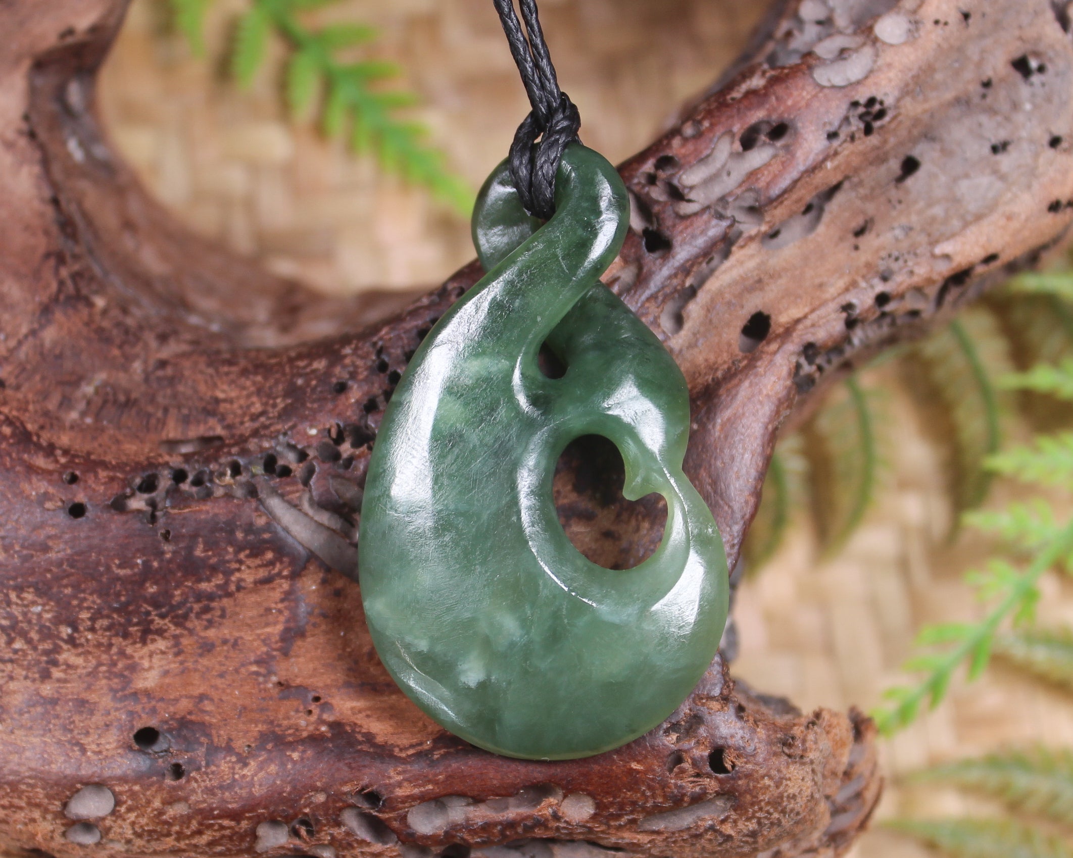 Koru Twist Pendant carved from Hapopo Pounamu - NZ Greenstone