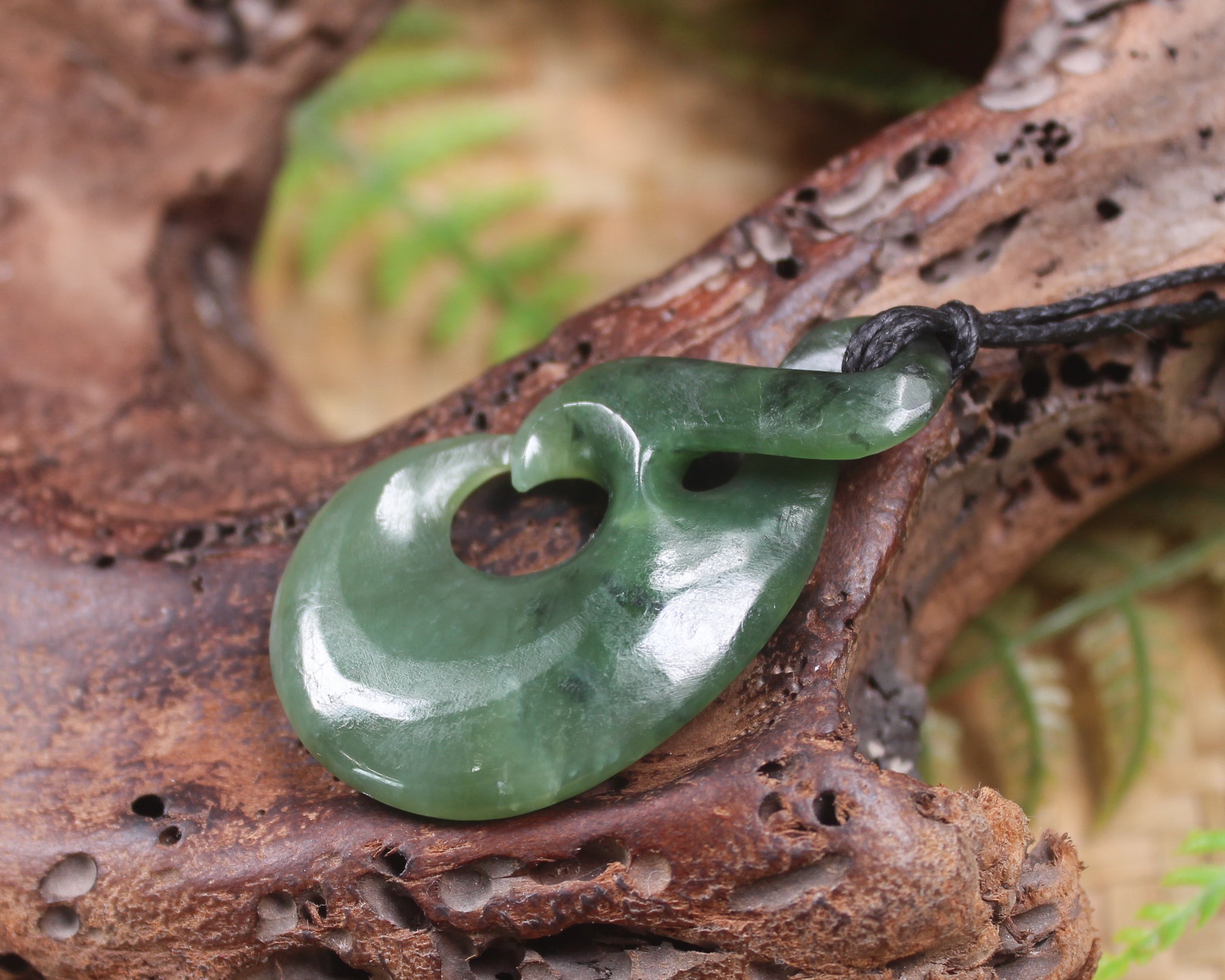 Koru Twist Pendant carved from Hapopo Pounamu - NZ Greenstone