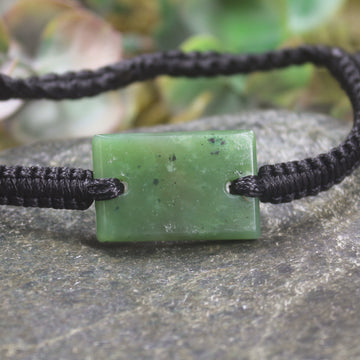 Adjustable cord bracelet with Hapopo Pounamu