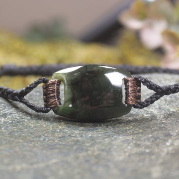 Adjustable cord bracelet with Rimu Pounamu