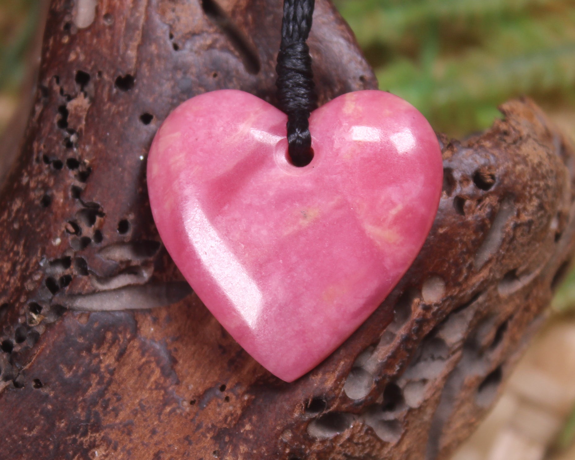 Heart carved from Rhodonite 