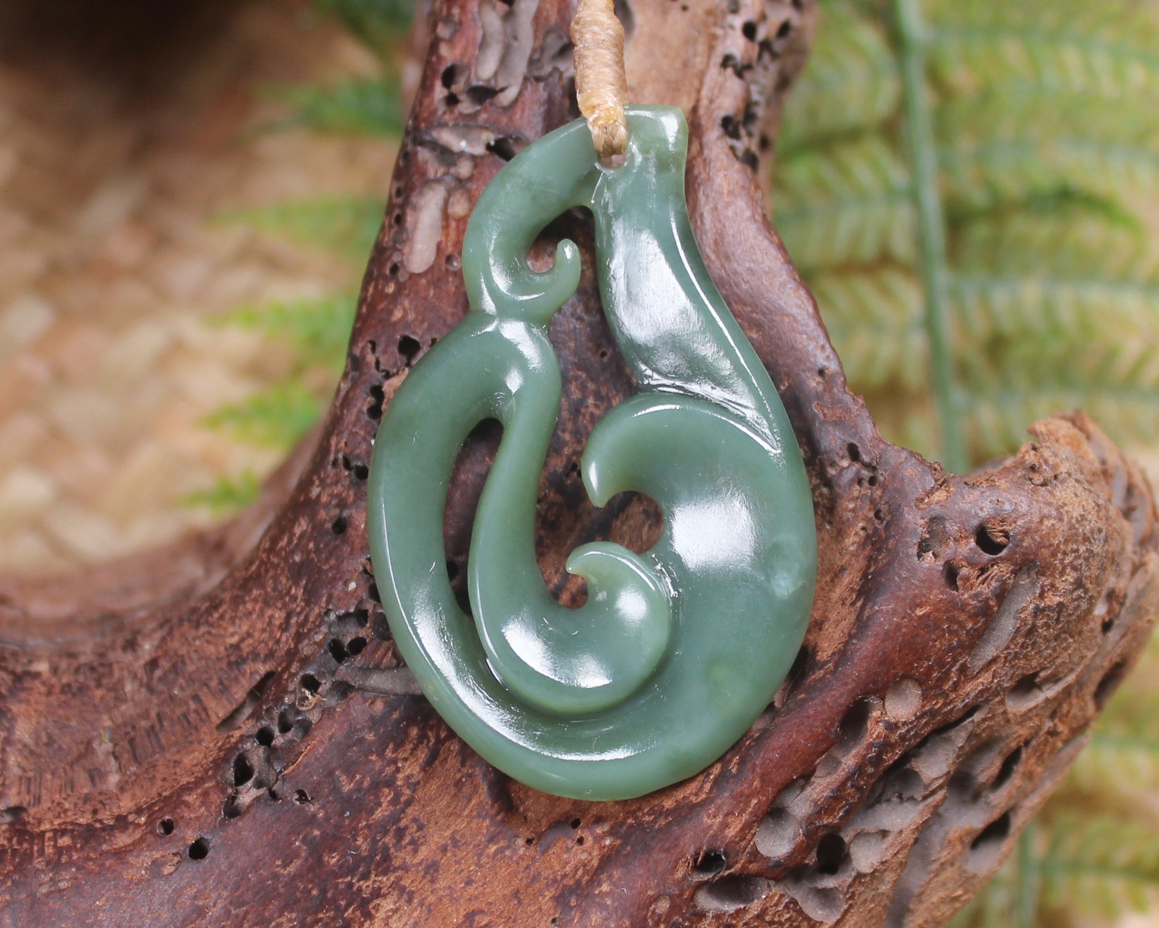 Koru or Spiral carved from Inanga Pounamu - NZ Greenstone