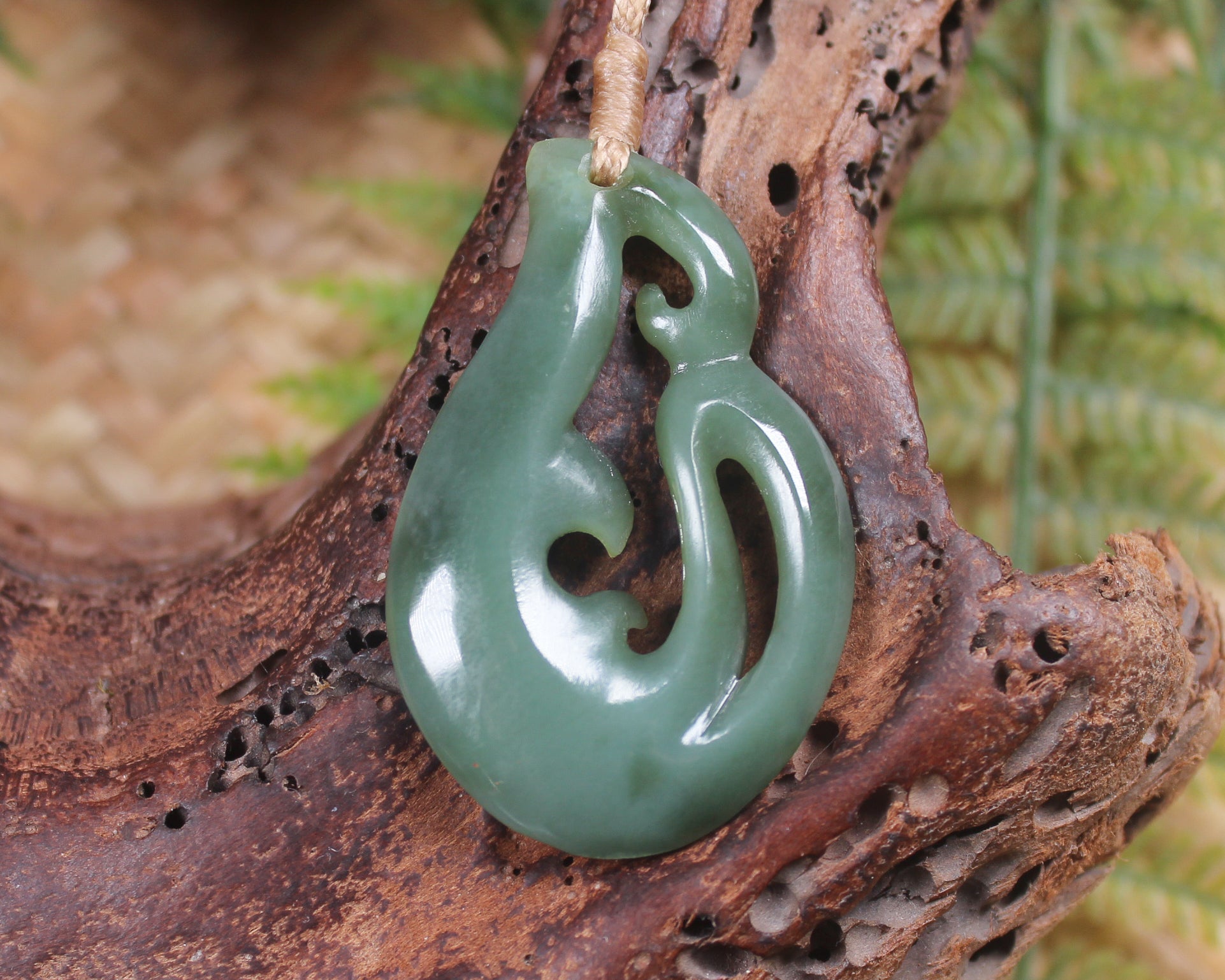 Koru or Spiral carved from Inanga Pounamu - NZ Greenstone