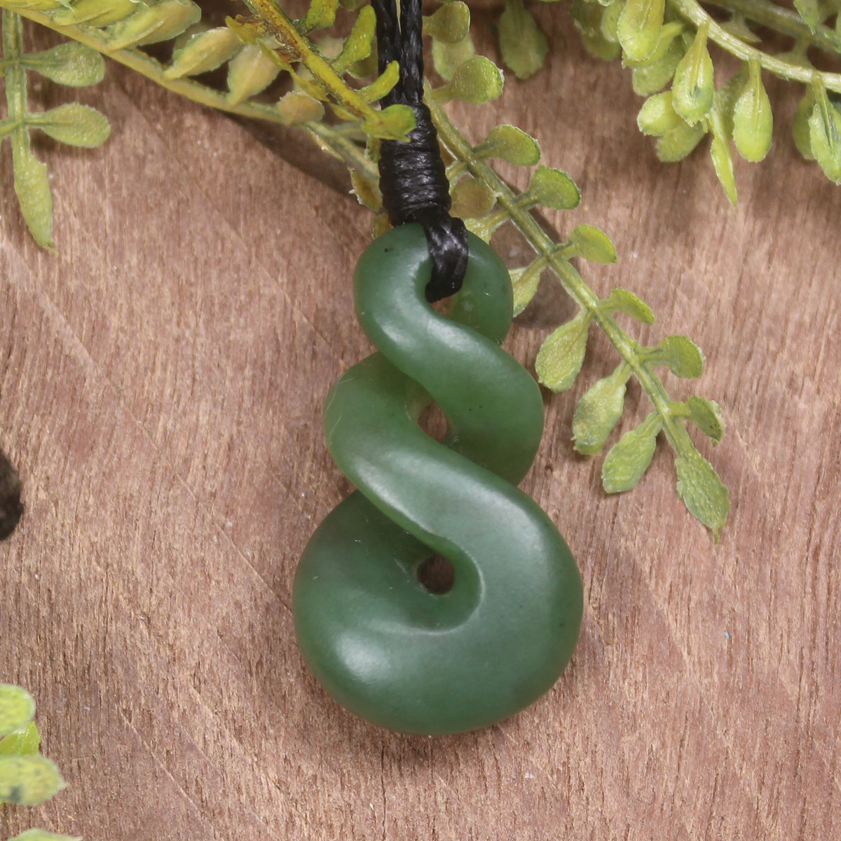 Twist or Pikorua carved from Hapopo Pounamu - NZ Greenstone