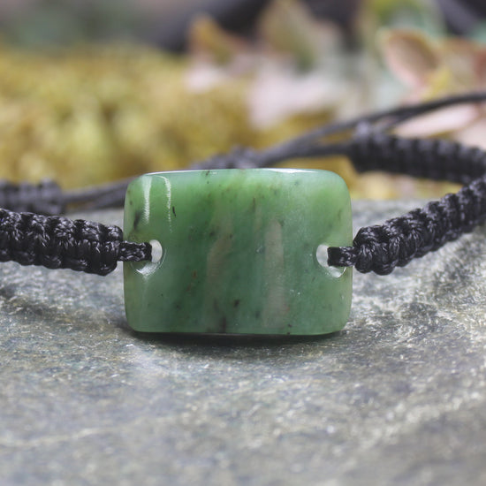 Adjustable cord bracelet with Hapopo Pounamu