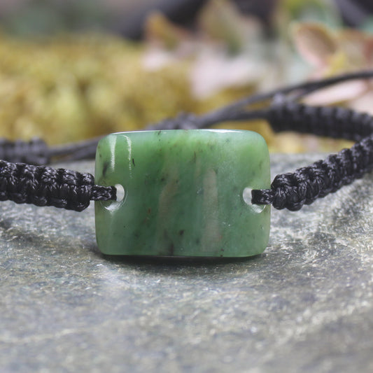 Adjustable cord bracelet with Hapopo Pounamu