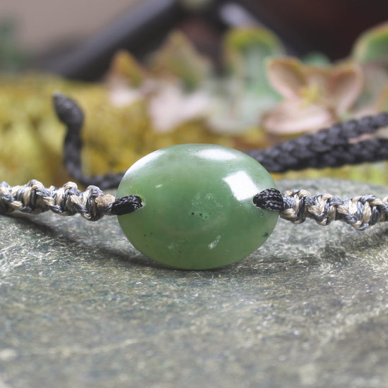 Adjustable cord bracelet with Hapopo Pounamu
