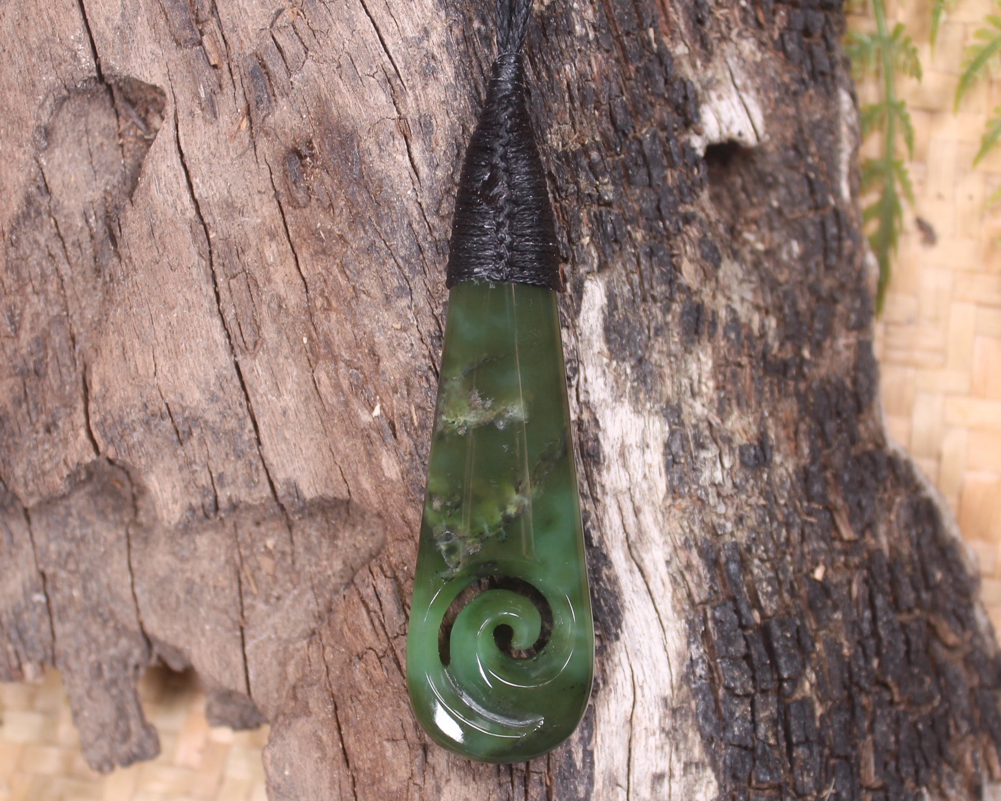 Roimata or Teardop with Koru carved from Rimu Pounamu - NZ Greenstone