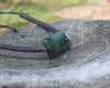Adjustable cord bracelet with Rimu Pounamu