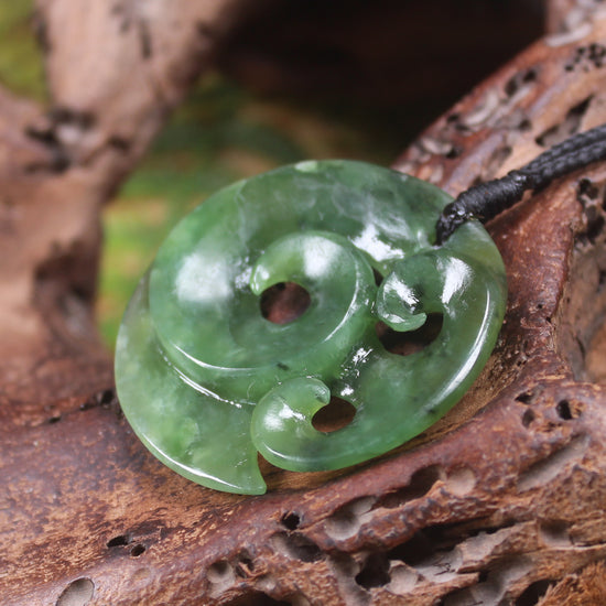 Koru Pendant carved from Hapopo Pounamu - NZ Greenstone