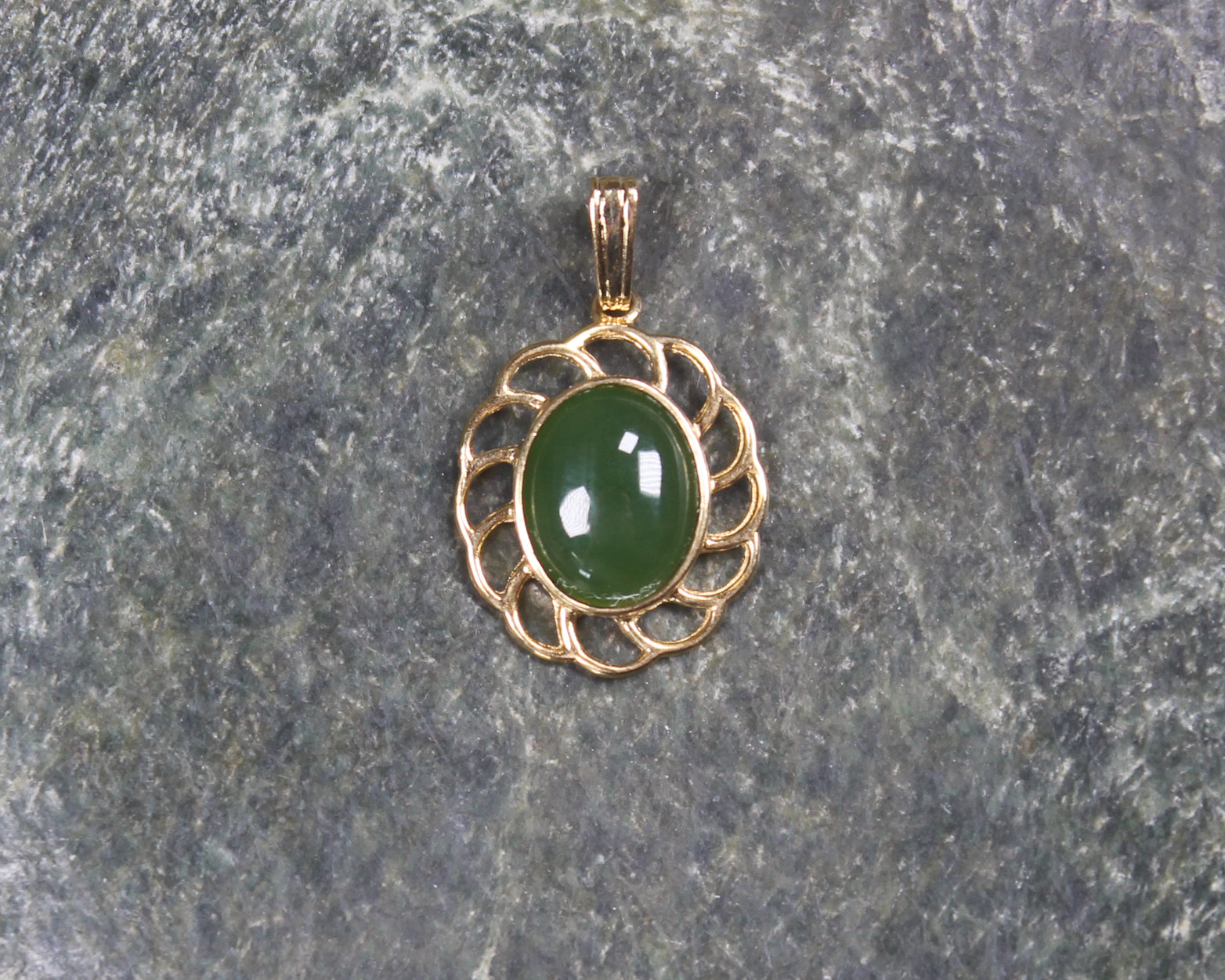 Kawakawa Pounamu pendant with a gold plated setting - NZ Greenstone