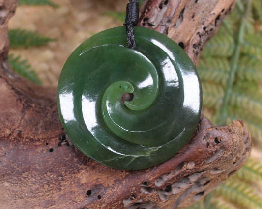 Koru pendant carved from Kawakawa Pounamu - NZ Greenstone