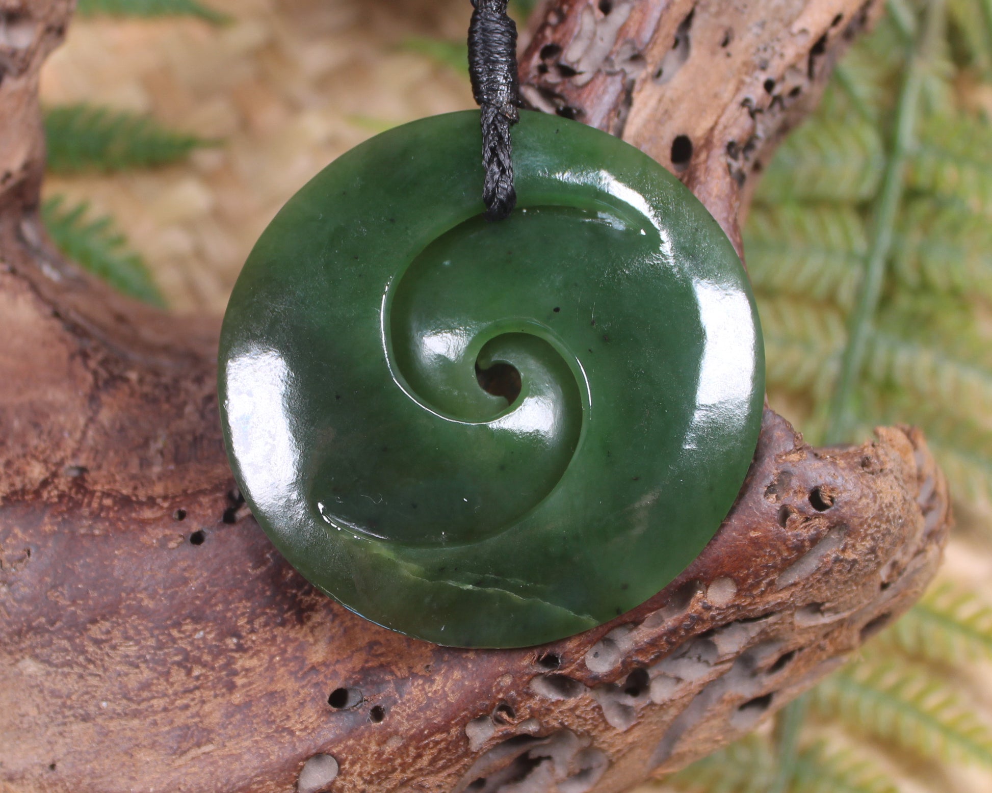 Koru pendant carved from Kawakawa Pounamu - NZ Greenstone