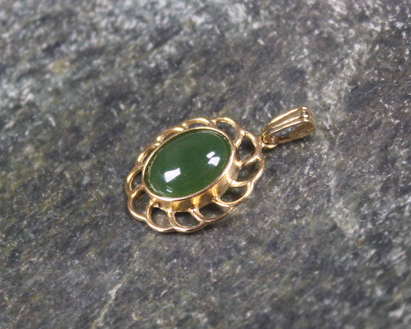 Kawakawa Pounamu pendant with a gold plated setting - NZ Greenstone