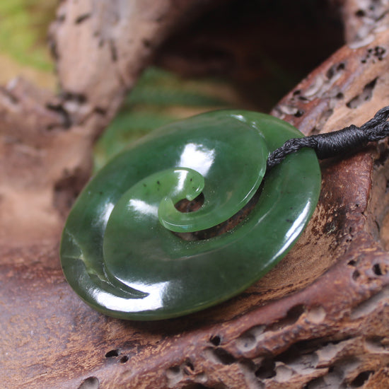 Koru pendant carved from Kawakawa Pounamu - NZ Greenstone