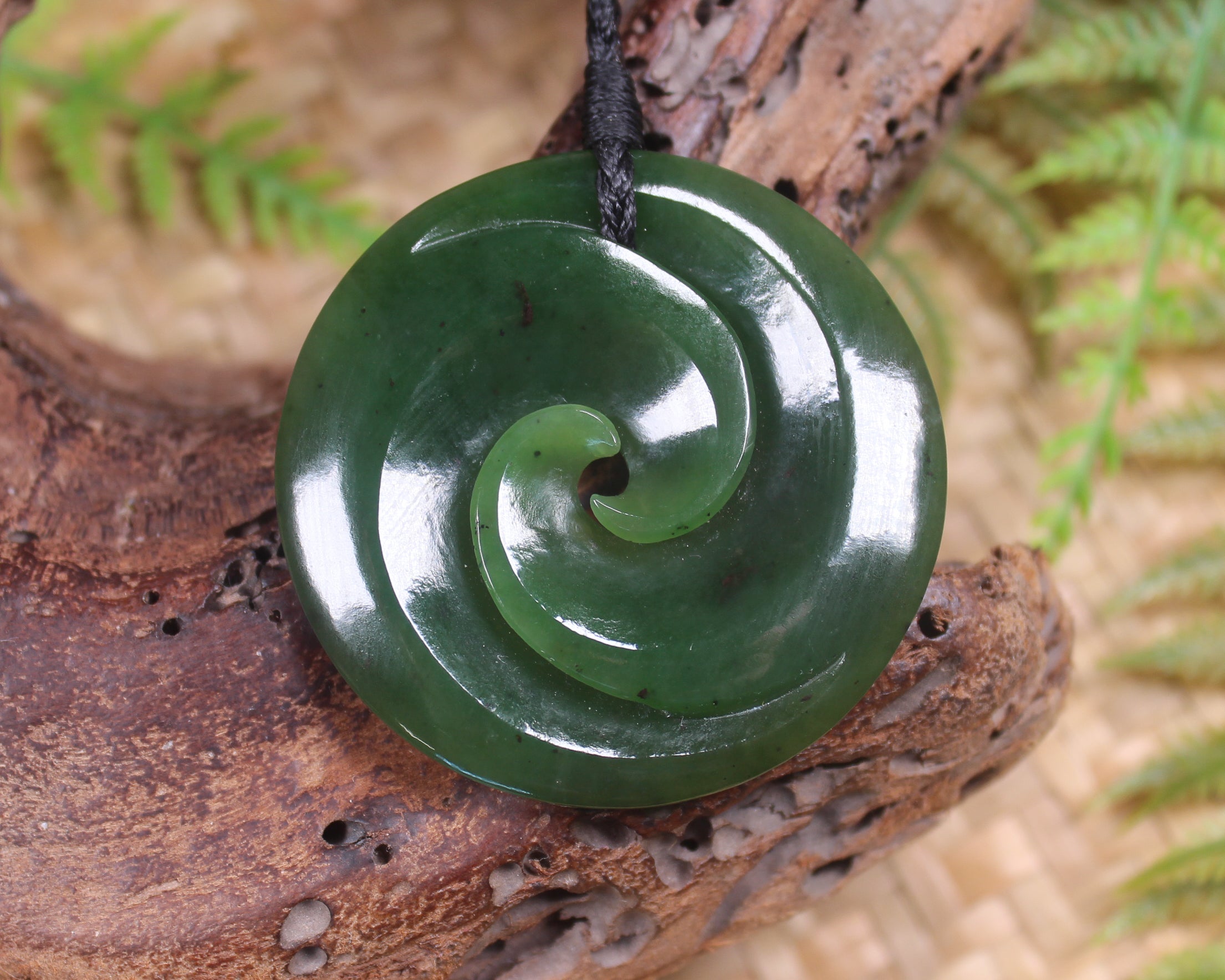 Koru pendant carved from Kawakawa Pounamu - NZ Greenstone