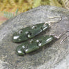 Roimata with Koru earrings carved from Rimu Pounamu - NZ Greenstone