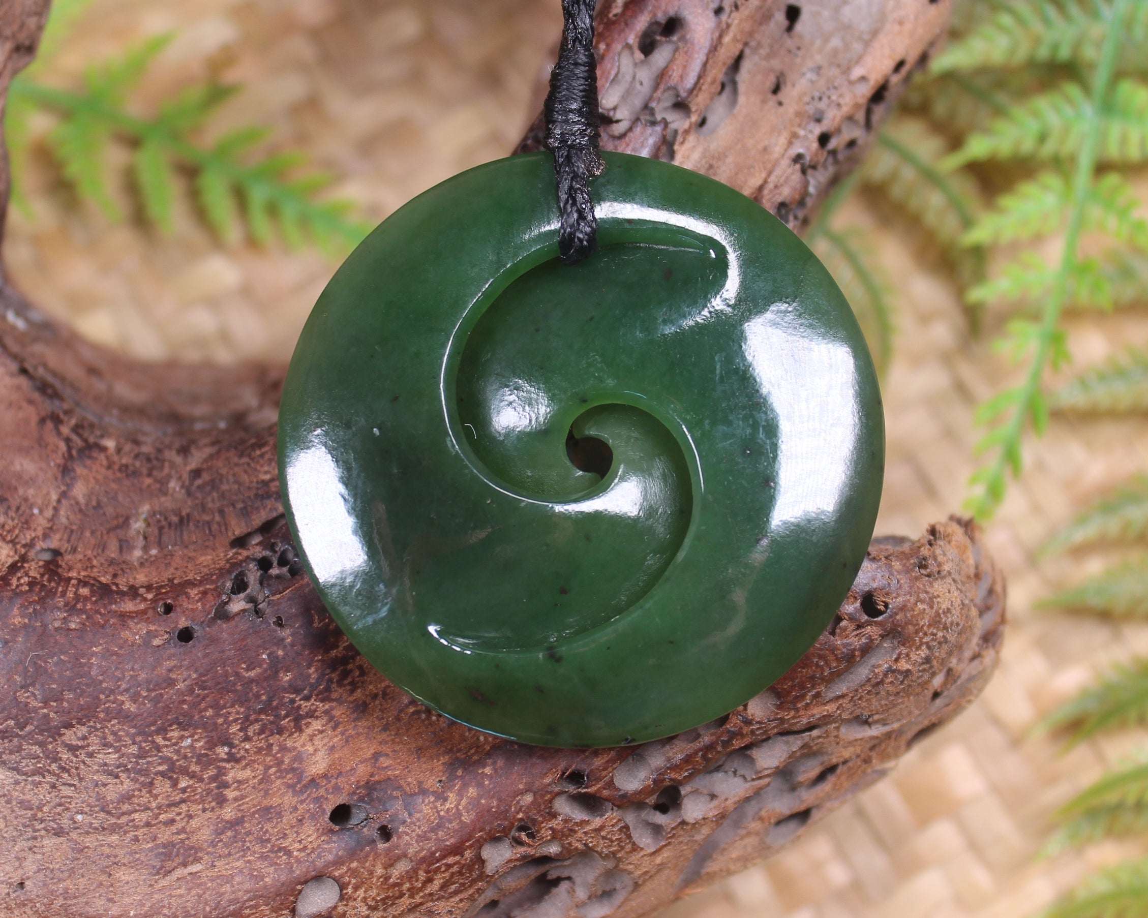 Koru pendant carved from Kawakawa Pounamu - NZ Greenstone