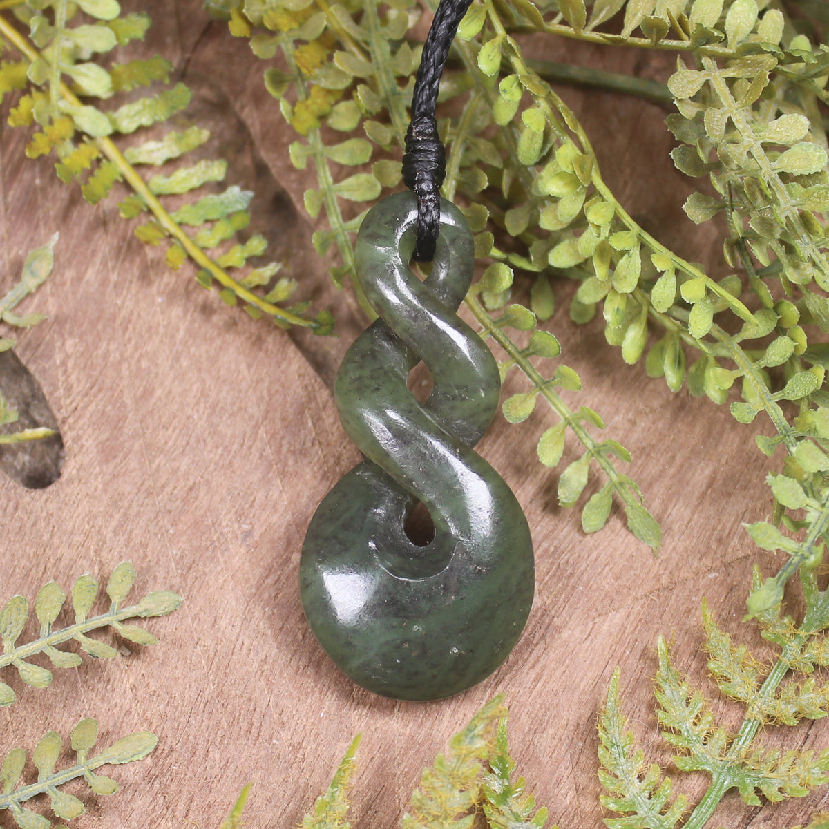 Twist or Pikorua carved from Hapopo Pounamu - NZ Greenstone