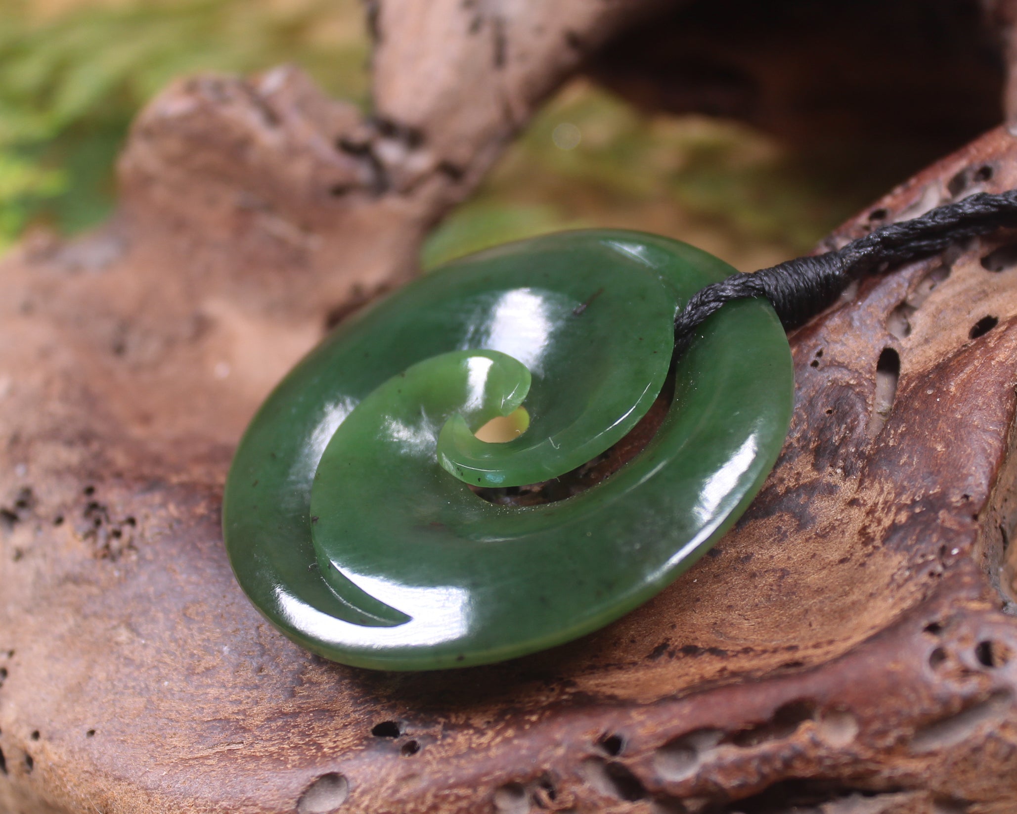 Koru pendant carved from Kawakawa Pounamu - NZ Greenstone