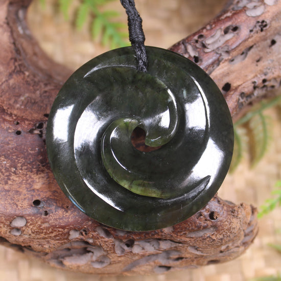 Koru carved from Rimu Pounamu - NZ Greenstone