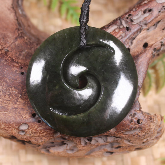 Koru carved from Rimu Pounamu - NZ Greenstone