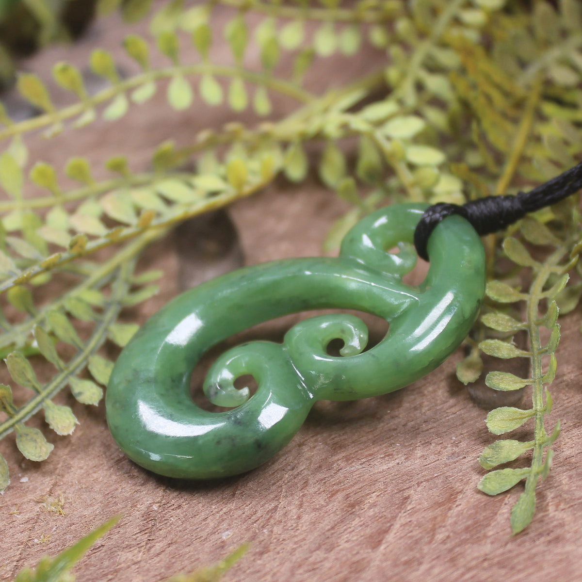 Hammerhead pendant carved from Hapopo Pounamu - NZ Greenstone
