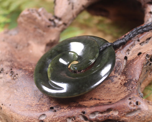 Koru carved from Rimu Pounamu - NZ Greenstone