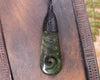 Roimata or Teardop with Koru carved from Rimu Pounamu - NZ Greenstone