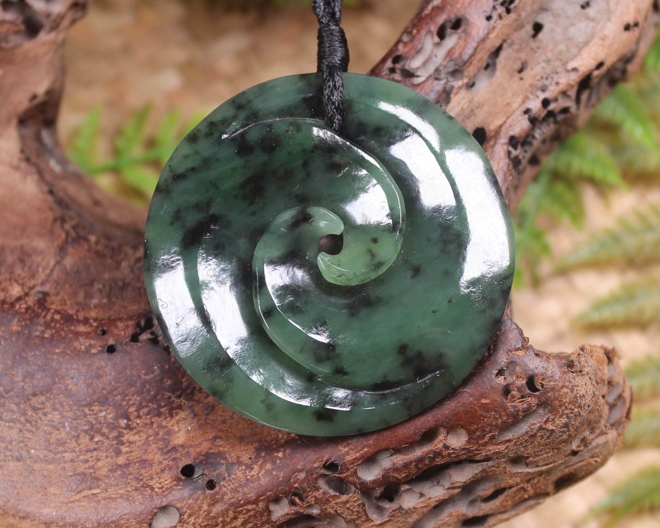 Koru carved from Rimu Pounamu - NZ Greenstone