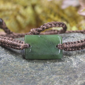 Adjustable cord bracelet with Hapopo Pounamu