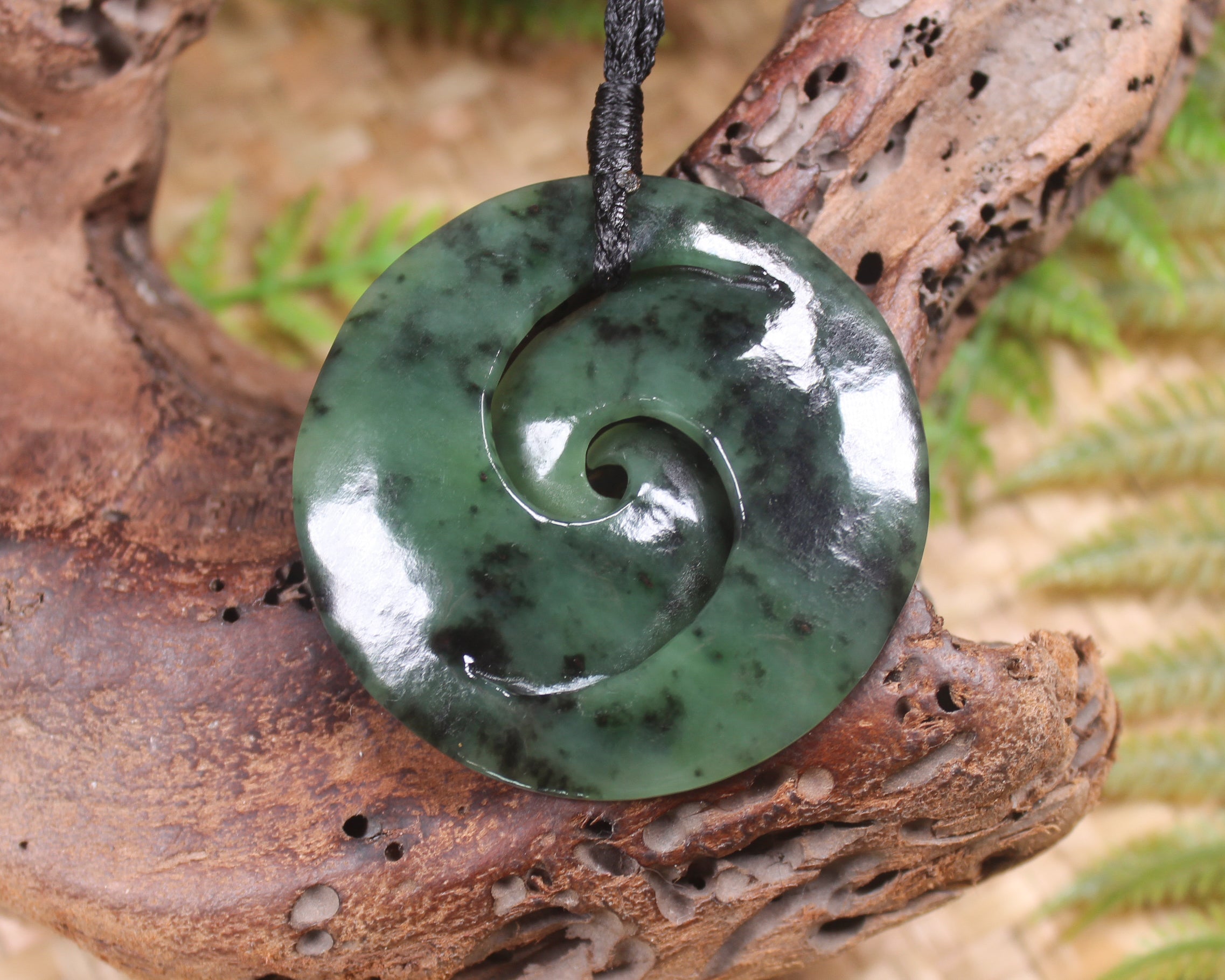 Koru carved from Rimu Pounamu - NZ Greenstone